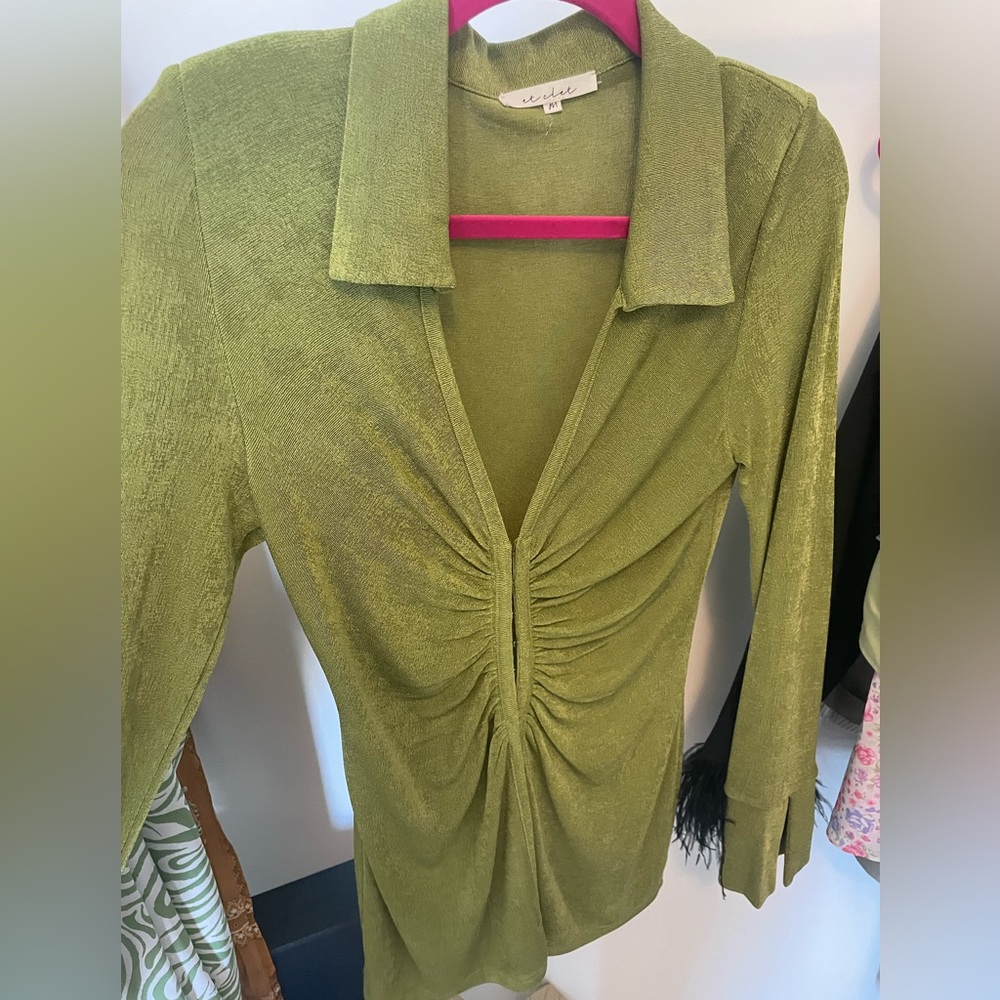 Medium front snap closure blouse.